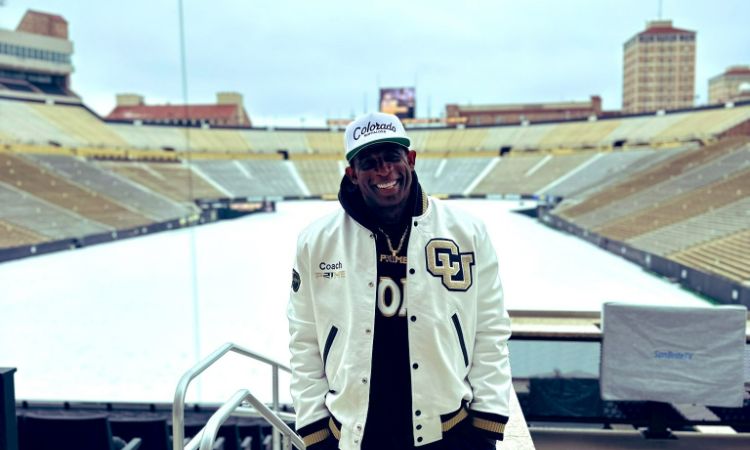 Shelomi Sanders's father, Deion Sanders. 